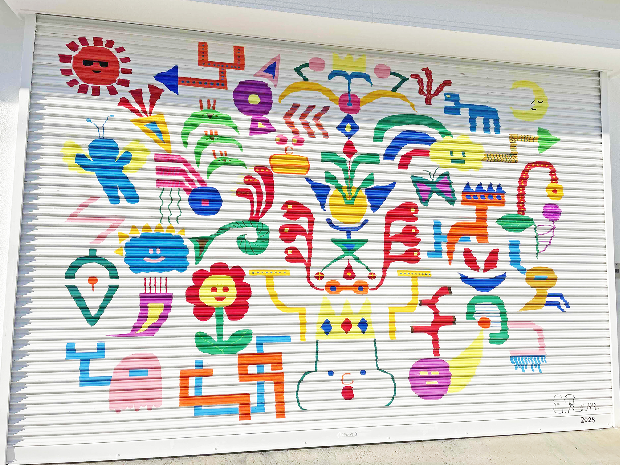 17ブーヴィエ・エミリオ・蓮氏のカラフルなシャッターアート