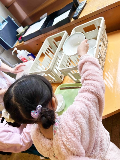 06片づける姿